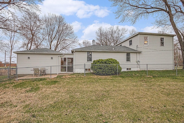 3804 Lincoln Ave, Saint Joseph, MI 49085 - rear view of house with a fenced backyard, a patio, and a lawn