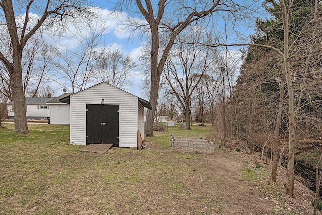 3804 Lincoln Ave, Saint Joseph, MI 49085 - view of yard featuring a storage unit and an outdoor structure