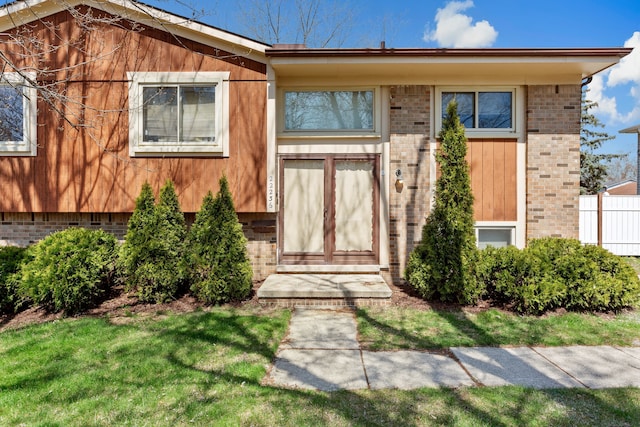 view of front of home with fence