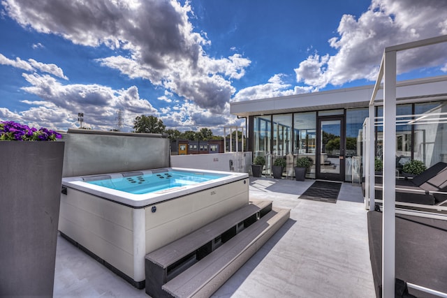 533 E Harrison Ave Unit 30, Royal Oak, MI 48067 - view of pool featuring a covered hot tub, a sunroom, and a patio area