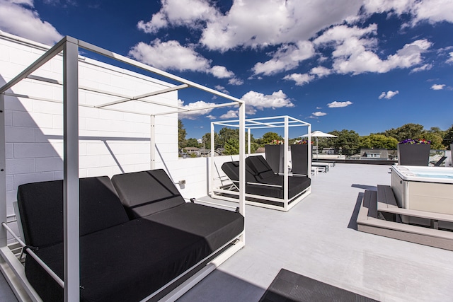 533 E Harrison Ave Unit 30, Royal Oak, MI 48067 - view of patio with a hot tub and outdoor lounge area