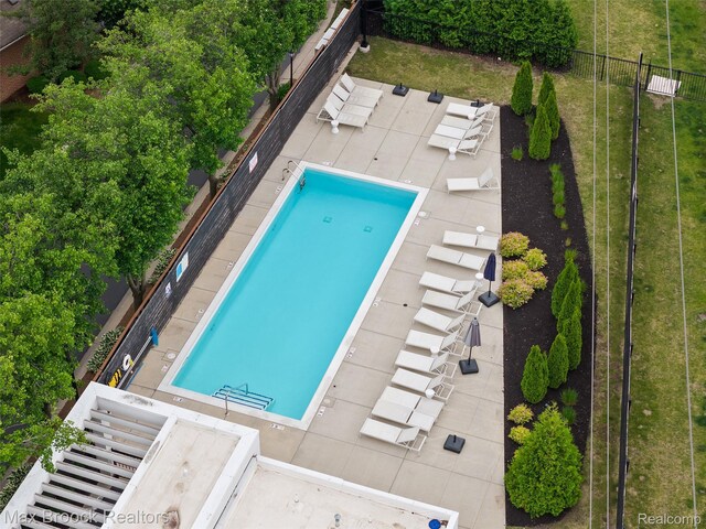 533 E Harrison Ave Unit 30, Royal Oak, MI 48067 - community pool featuring view of wooded area
