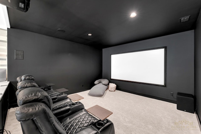cinema room with recessed lighting and carpet