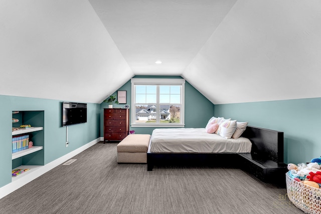 carpeted bedroom with baseboards, lofted ceiling, and visible vents