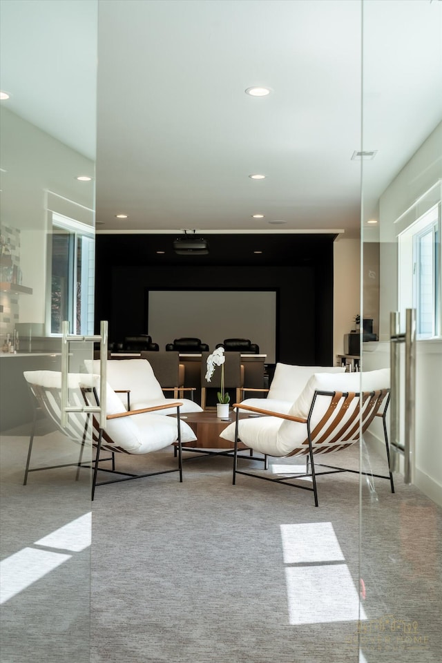 living room featuring recessed lighting and carpet flooring