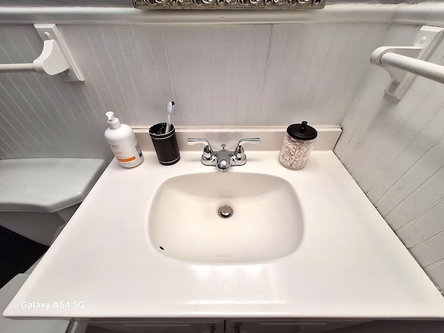7541 Sloan St, Taylor, MI 48180 - details with wood walls and vanity