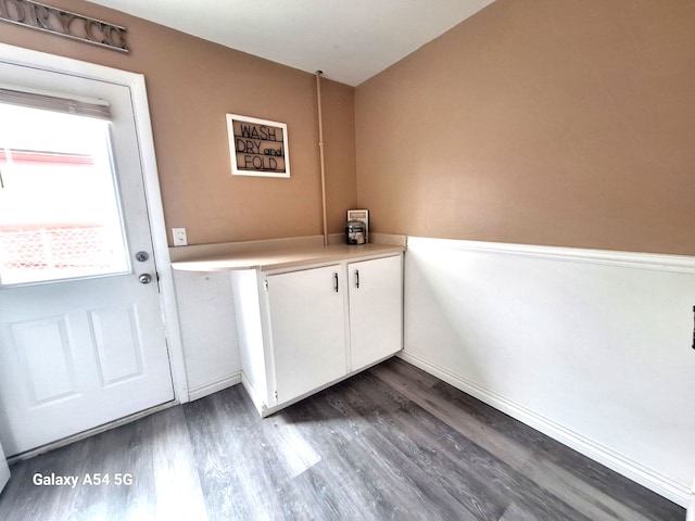 7541 Sloan St, Taylor, MI 48180 - washroom featuring baseboards and dark wood-style floors