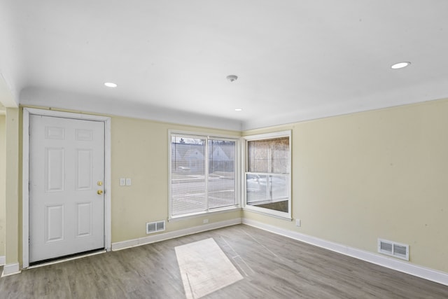 interior space with visible vents and baseboards