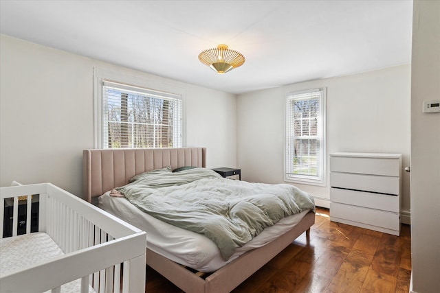 bedroom featuring wood finished floors