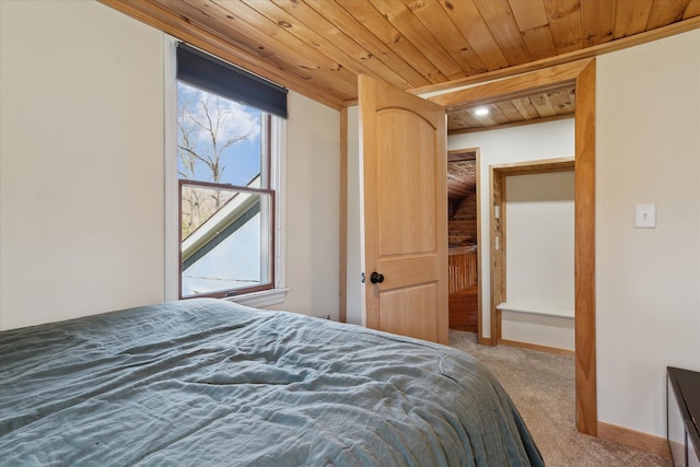 bedroom with carpet and wooden ceiling