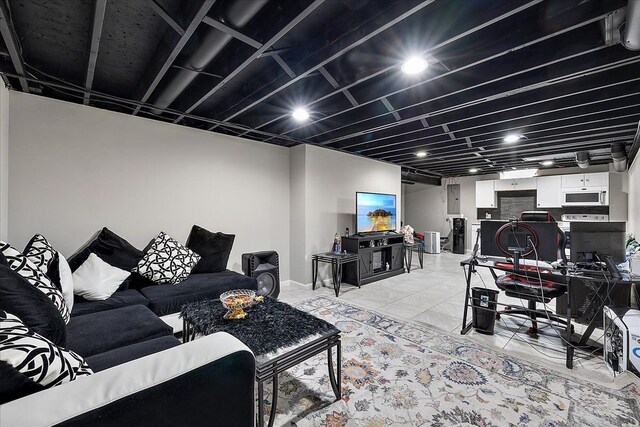 living area featuring baseboards