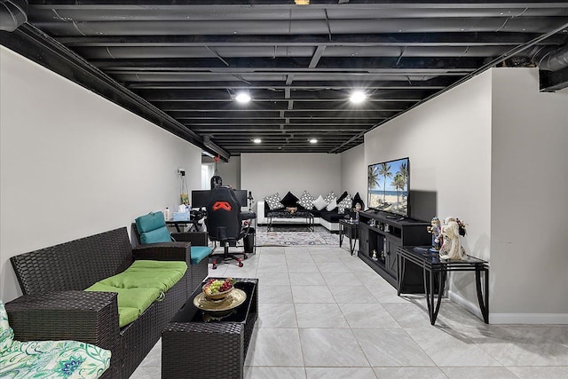 living area with light tile patterned floors