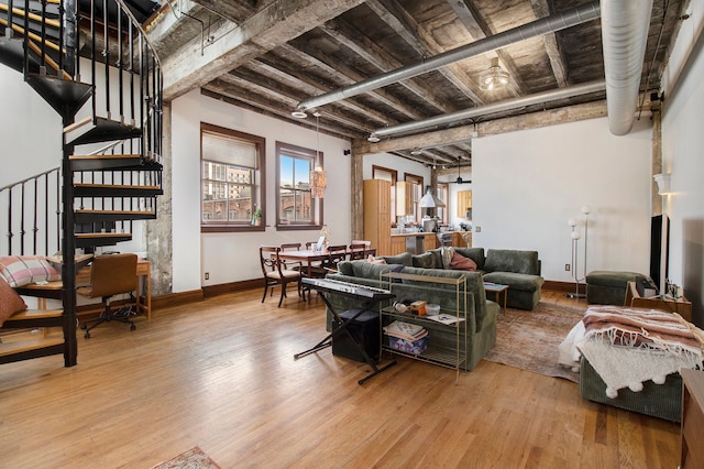 3139 Woodward Ave Unit 6, Detroit, MI 48201 - living area featuring wood finished floors and stairway