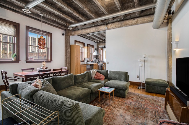 3139 Woodward Ave Unit 6, Detroit, MI 48201 - living room featuring wood finished floors and baseboards