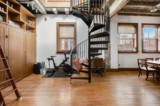 3139 Woodward Ave Unit 6, Detroit, MI 48201 - foyer entrance featuring stairway, light wood-style flooring, and beam ceiling