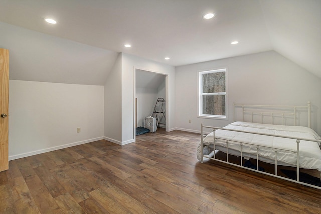 10412 W Woodrow Rd, Shelby, MI 49455 - bedroom with wood finished floors, baseboards, vaulted ceiling, and recessed lighting