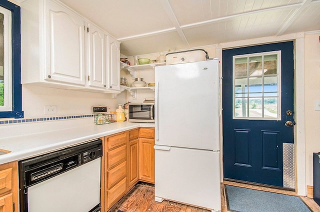 kitchen with open shelves, light countertops, light wood-type flooring, white appliances, and white cabinetry
