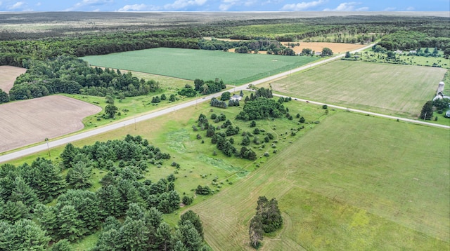 birds eye view of property featuring a rural view