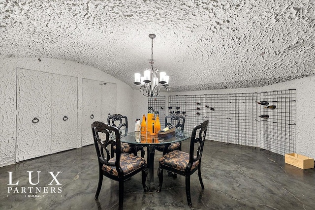 dining area featuring concrete floors, lofted ceiling, and a notable chandelier