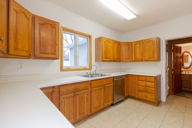 kitchen featuring ornamental molding, light countertops, brown cabinetry, stainless steel dishwasher, and a sink