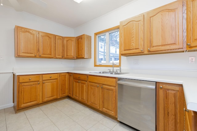 kitchen with ornamental molding, light tile patterned floors, light countertops, dishwasher, and a sink