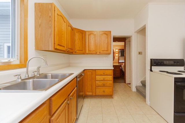 kitchen with stainless steel dishwasher, light tile patterned floors, white range with electric cooktop, light countertops, and a sink