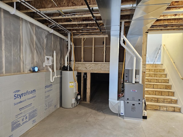 unfinished below grade area with water heater and stairs