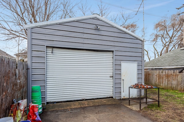 detached garage with fence