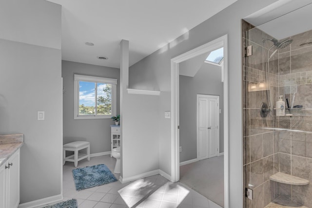 bathroom featuring toilet, tile patterned flooring, visible vents, and a stall shower