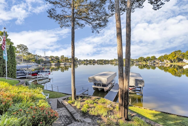 dock area featuring a water view and boat lift
