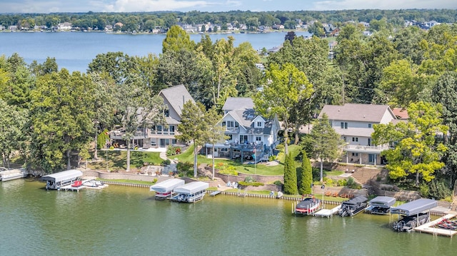 birds eye view of property featuring a water view