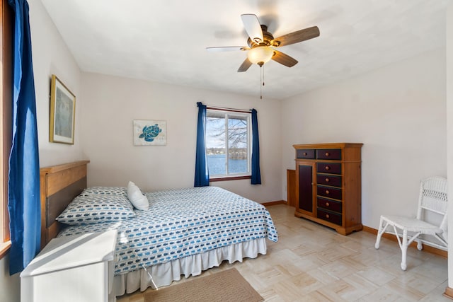 11672 Bradley Dr, Jerome, MI 49249 - bedroom with baseboards and a ceiling fan