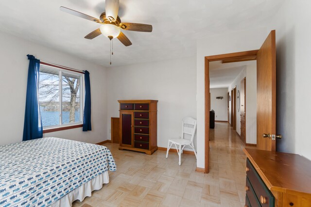 11672 Bradley Dr, Jerome, MI 49249 - bedroom with baseboards and a ceiling fan