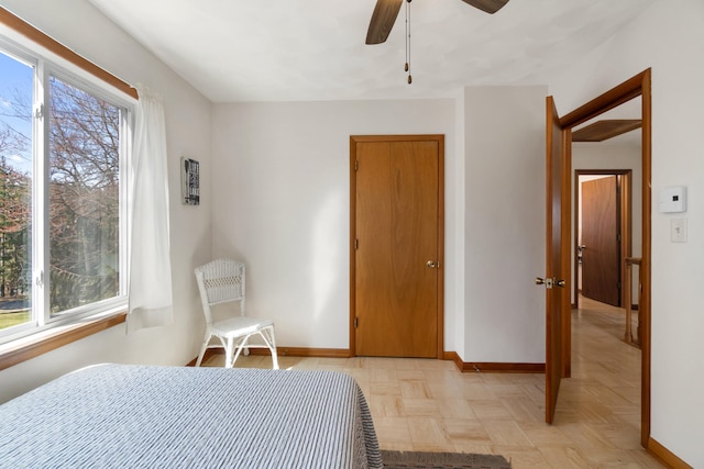 11672 Bradley Dr, Jerome, MI 49249 - bedroom featuring multiple windows and baseboards