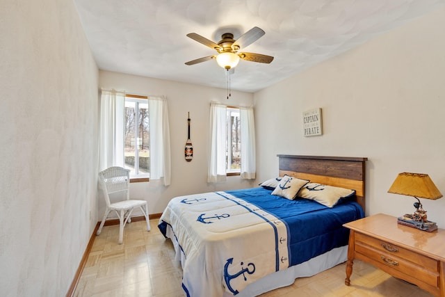 11672 Bradley Dr, Jerome, MI 49249 - bedroom featuring baseboards and a ceiling fan
