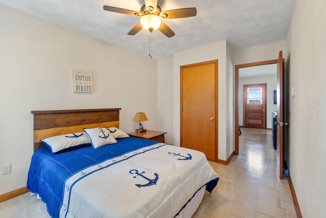 11672 Bradley Dr, Jerome, MI 49249 - bedroom with a closet, baseboards, ceiling fan, and light floors