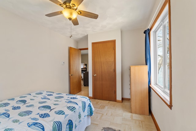 11672 Bradley Dr, Jerome, MI 49249 - bedroom featuring baseboards and a ceiling fan