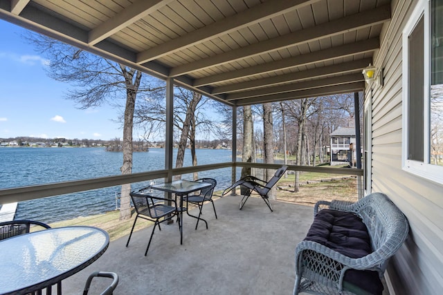 11672 Bradley Dr, Jerome, MI 49249 - sunroom / solarium featuring a water view and beamed ceiling