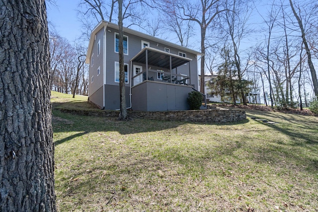 11672 Bradley Dr, Jerome, MI 49249 - rear view of house featuring a yard