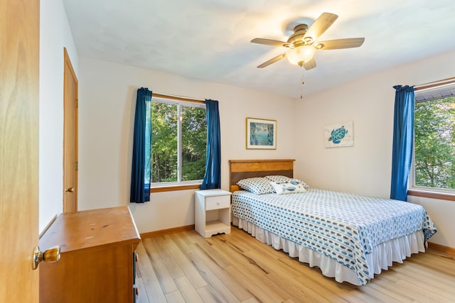 11672 Bradley Dr, Jerome, MI 49249 - bedroom featuring light wood-style floors and a ceiling fan