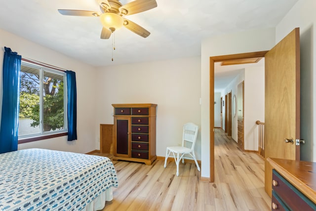 11672 Bradley Dr, Jerome, MI 49249 - bedroom featuring light wood finished floors and a ceiling fan