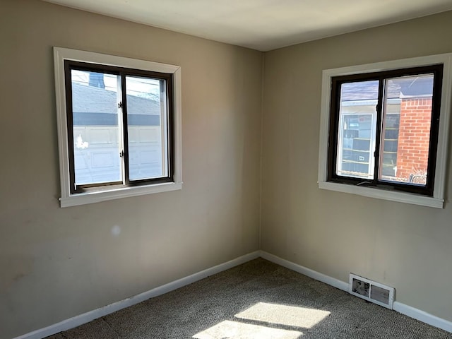 22169 Fairfax St, Taylor, MI 48180 - unfurnished room featuring carpet, visible vents, baseboards, and a healthy amount of sunlight