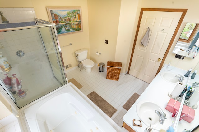 full bath with a jetted tub, a sink, double vanity, and a stall shower