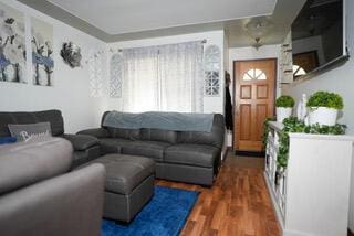 living area with wood finished floors