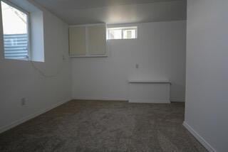 basement with baseboards and carpet floors