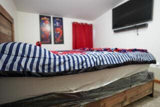 bedroom featuring carpet