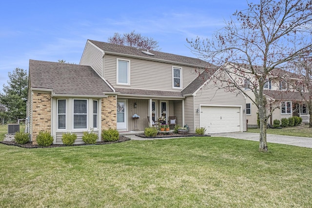traditional-style home with a front lawn, a shingled roof, a garage, and driveway