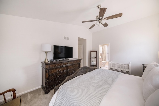 bedroom with baseboards, a ceiling fan, visible vents, lofted ceiling, and carpet