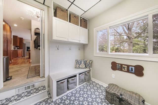 mudroom featuring baseboards and visible vents
