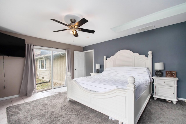 bedroom with visible vents, baseboards, a ceiling fan, tile patterned floors, and access to outside
